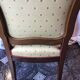 Louis Philippe style XIX century armchair with a violet backrest.