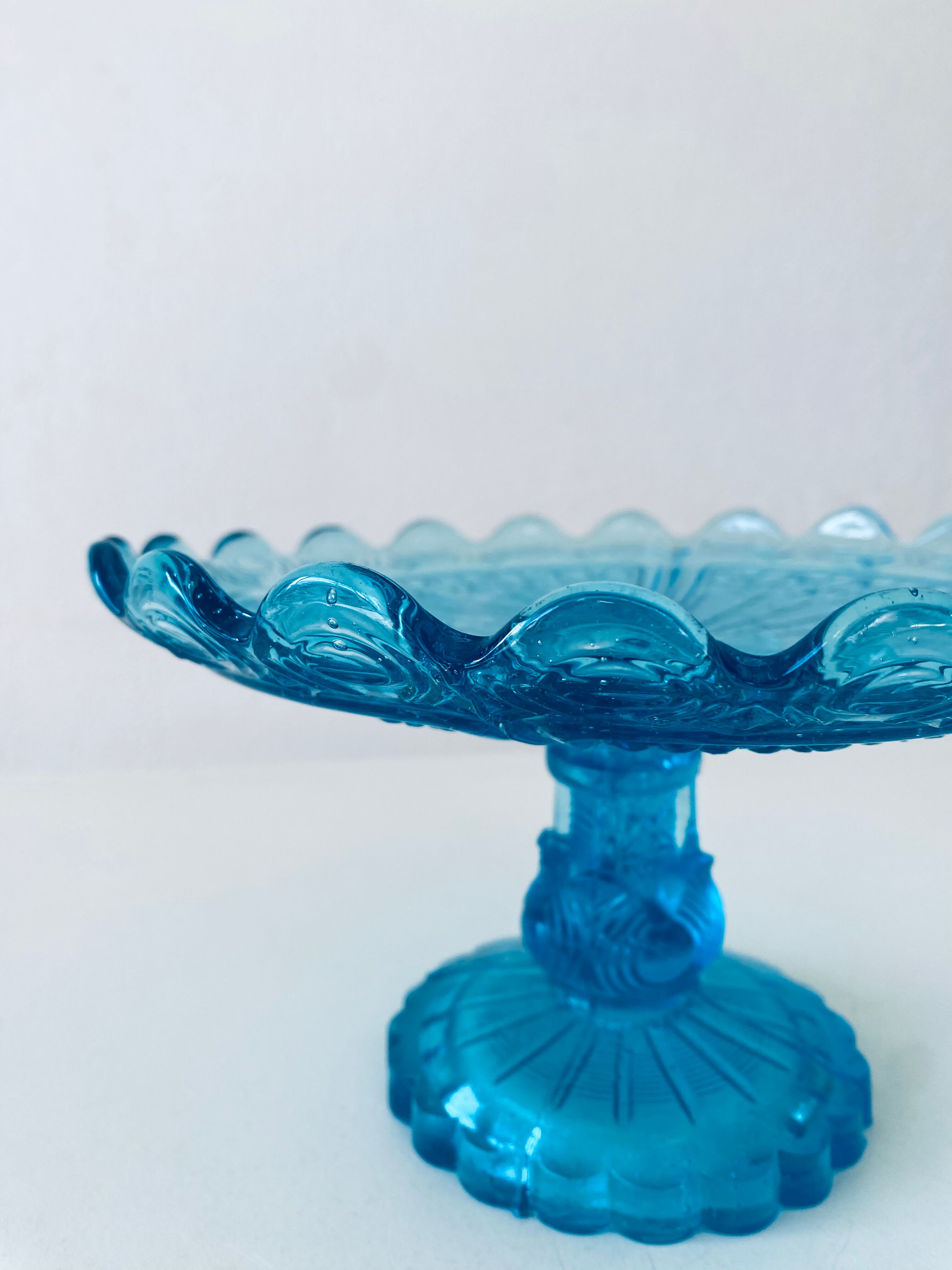 Blue glass stand cup