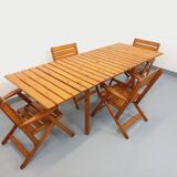 Vintage garden furniture set consisting of a table with extensions and 4 armchairs
