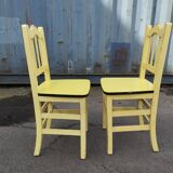 Pair of wooden and yellow formica chairs