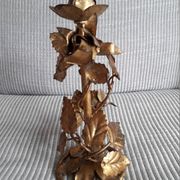Vintage vegetable candle holder with a decoration of roses and golden leaves