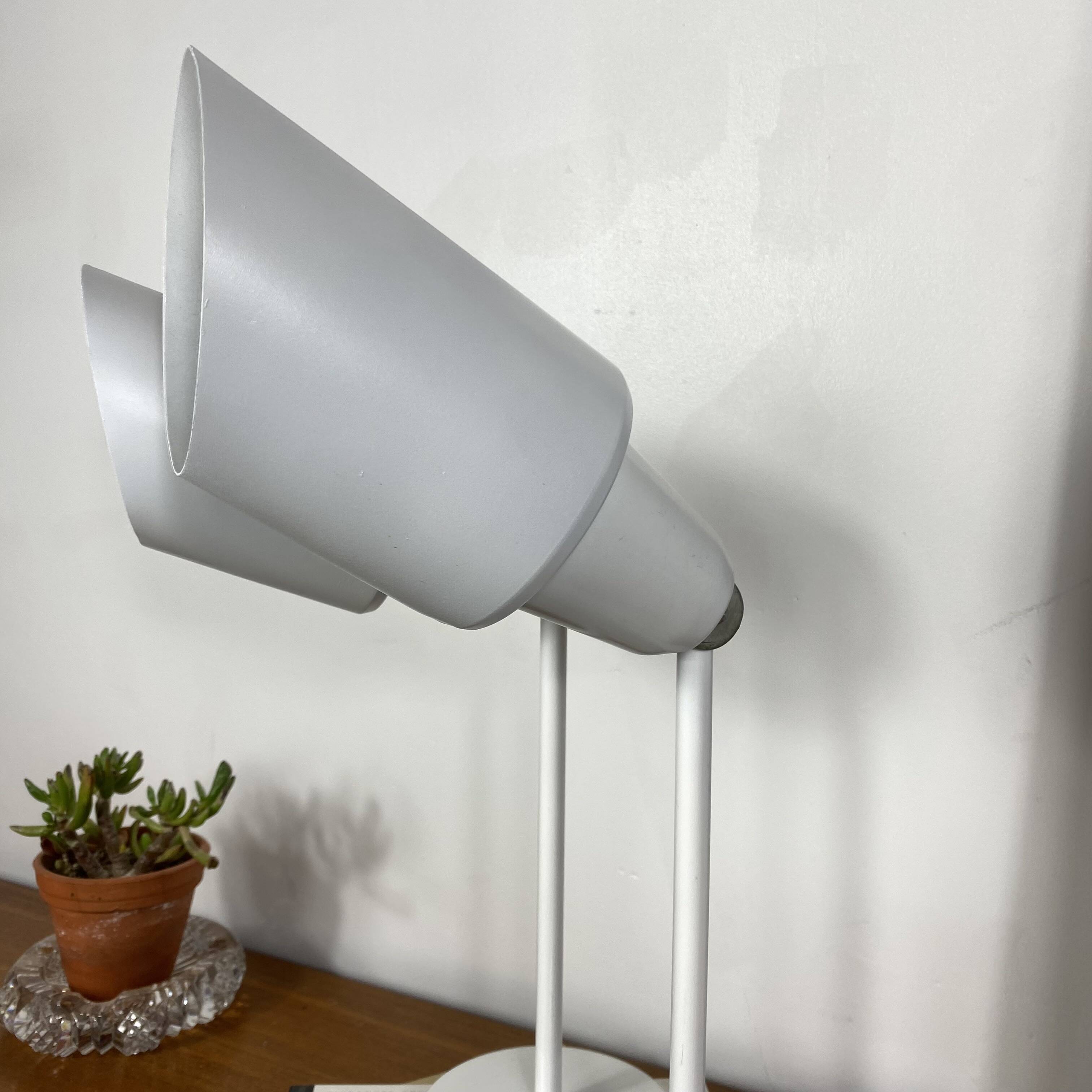 Pair of old industrial adjustable wall sconces in white metal.