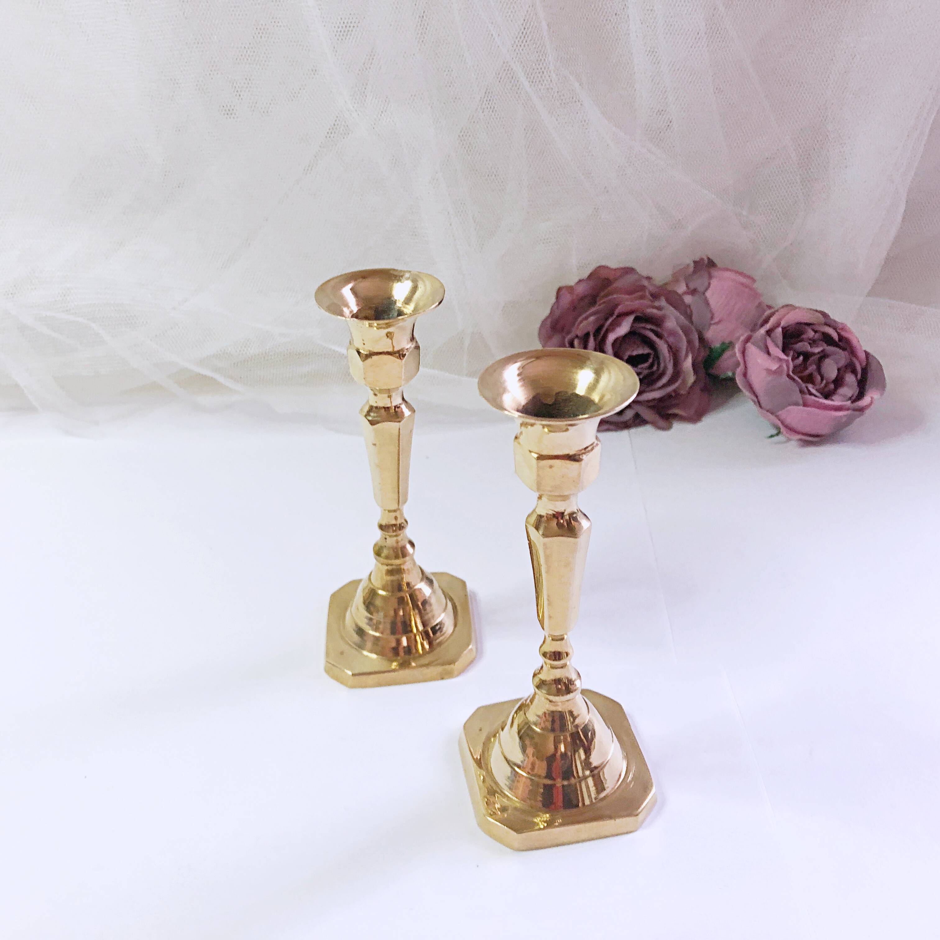 Pair of small brass candlesticks