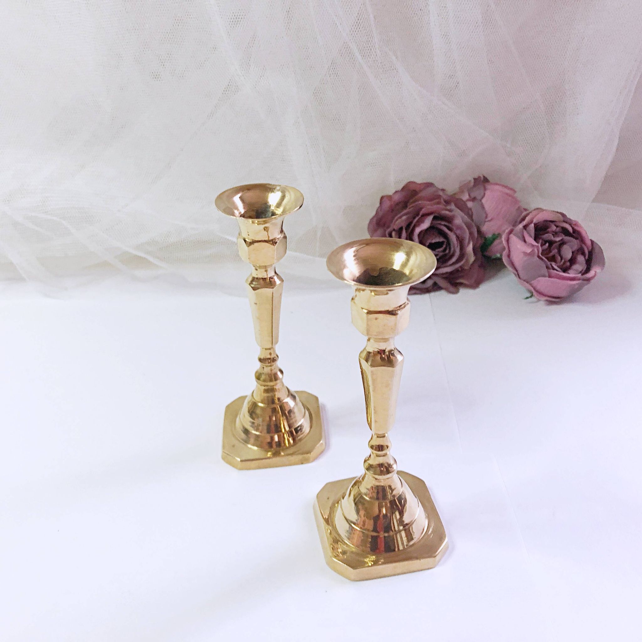 Pair of small brass candlesticks