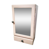 Pink bathroom cabinet