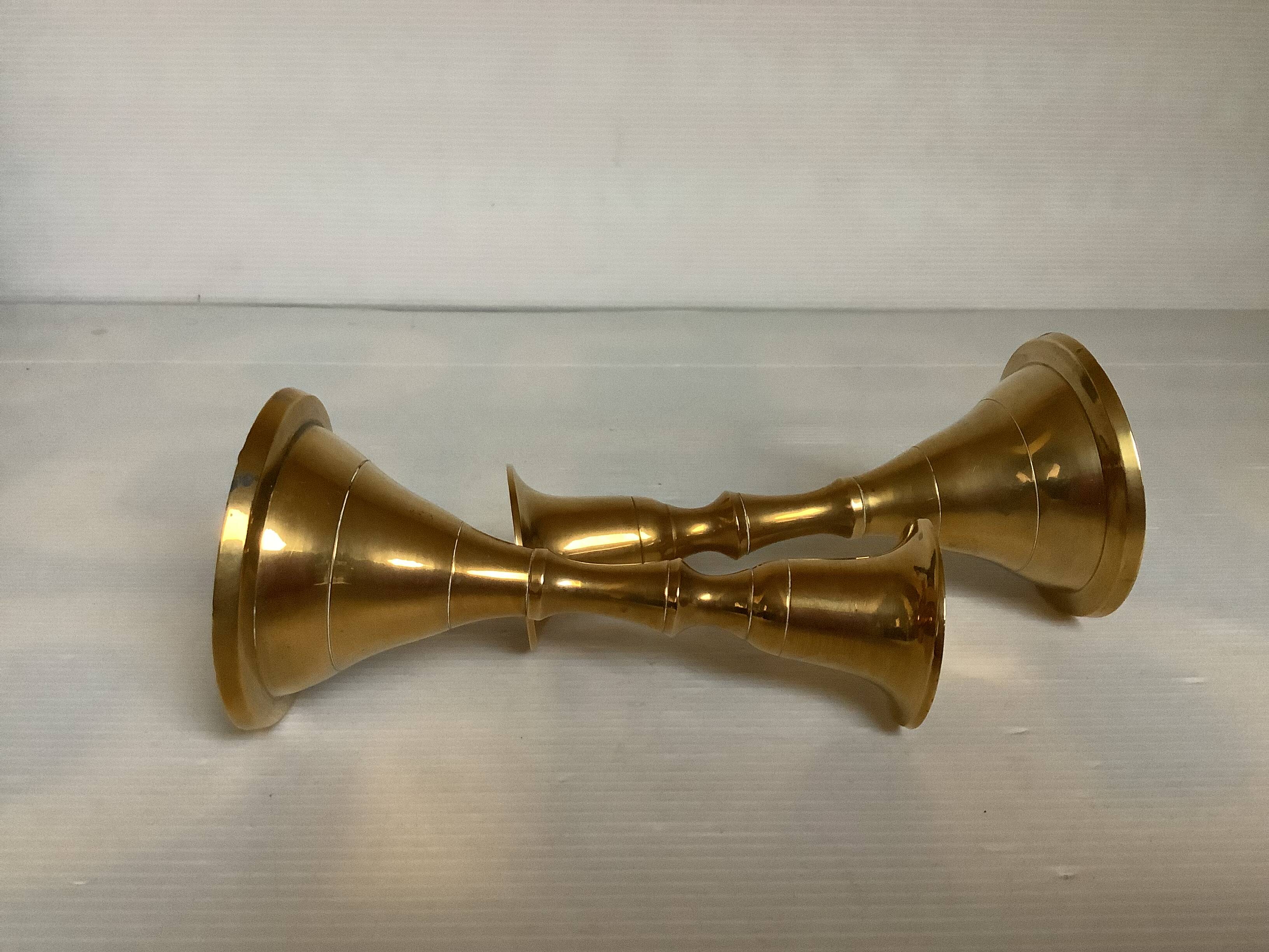 Pair of small brass tulip-shaped candlesticks