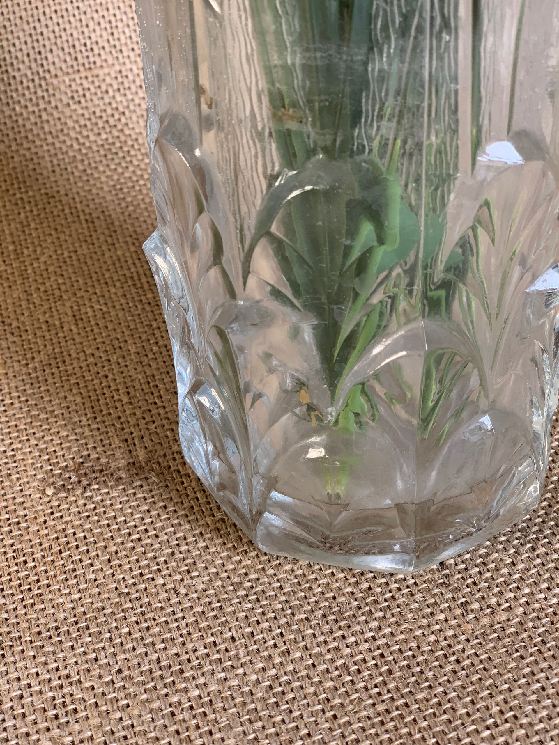Old cylindrical vase in 40s style in thick glass