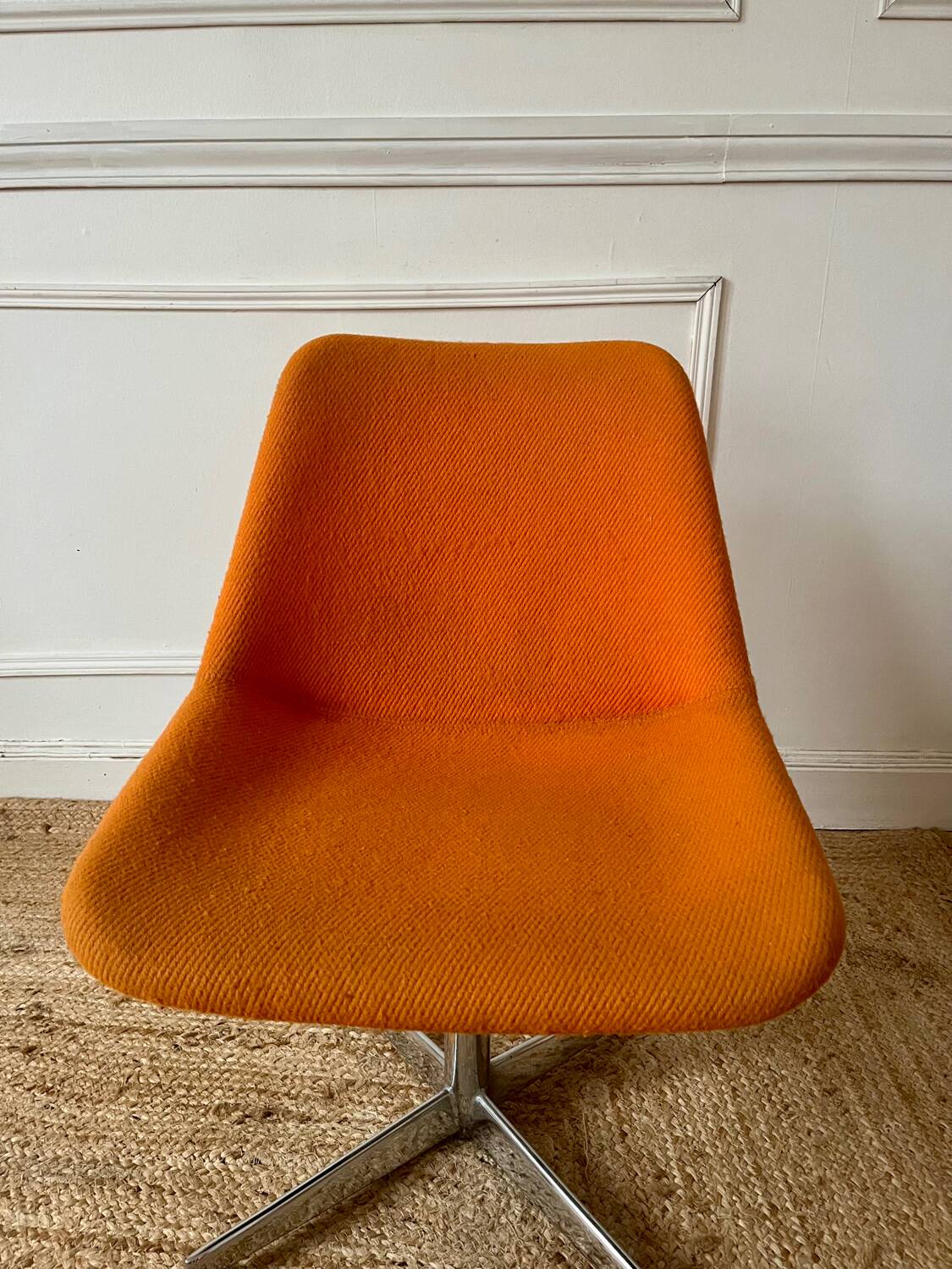 Chrome metal chair with orange fabric from the 70s.