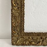 Old frame in gilded wood with stucco decoration circa 1900