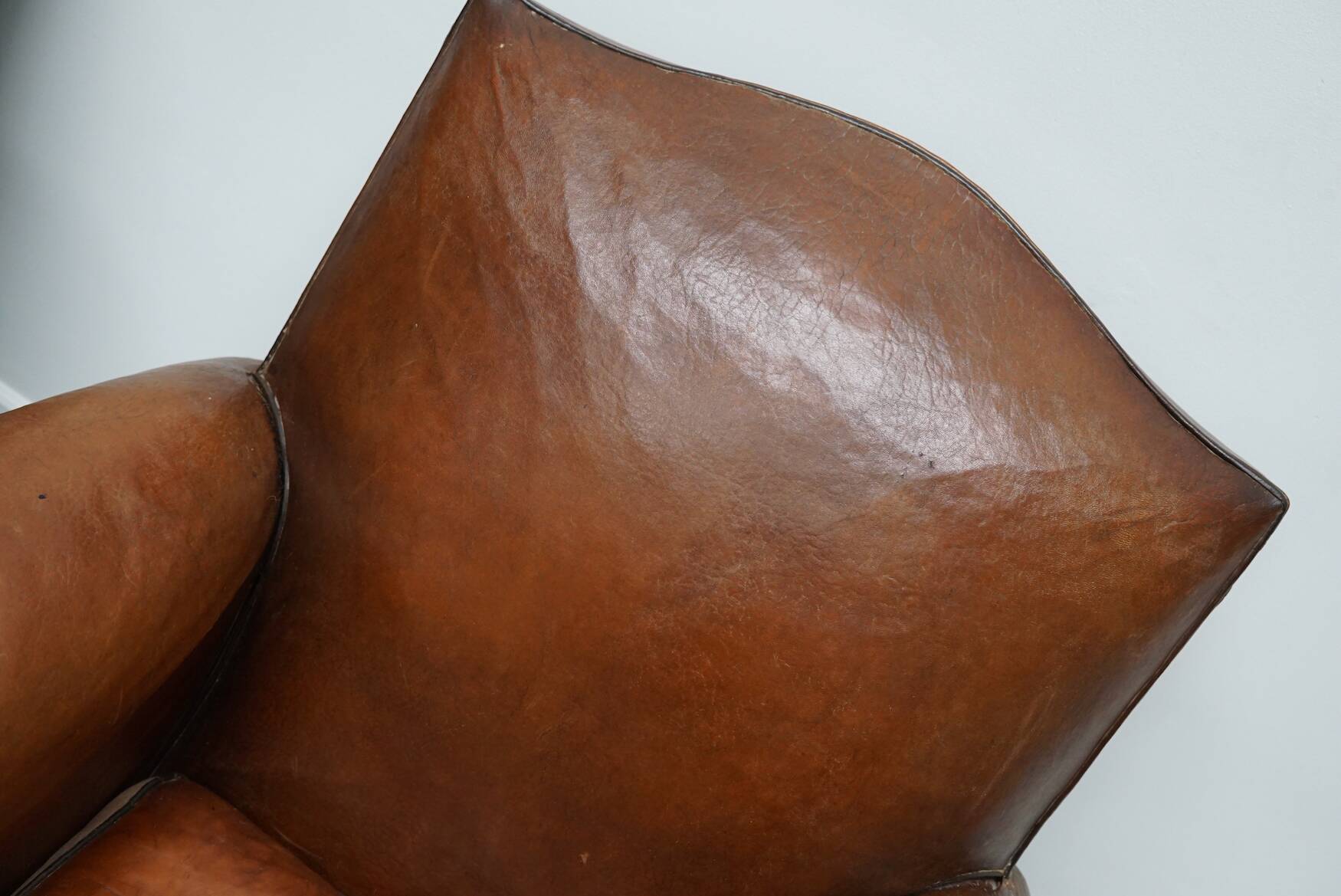 Pair of French Cognac Moustache Back Leather Club Chairs, 1940s