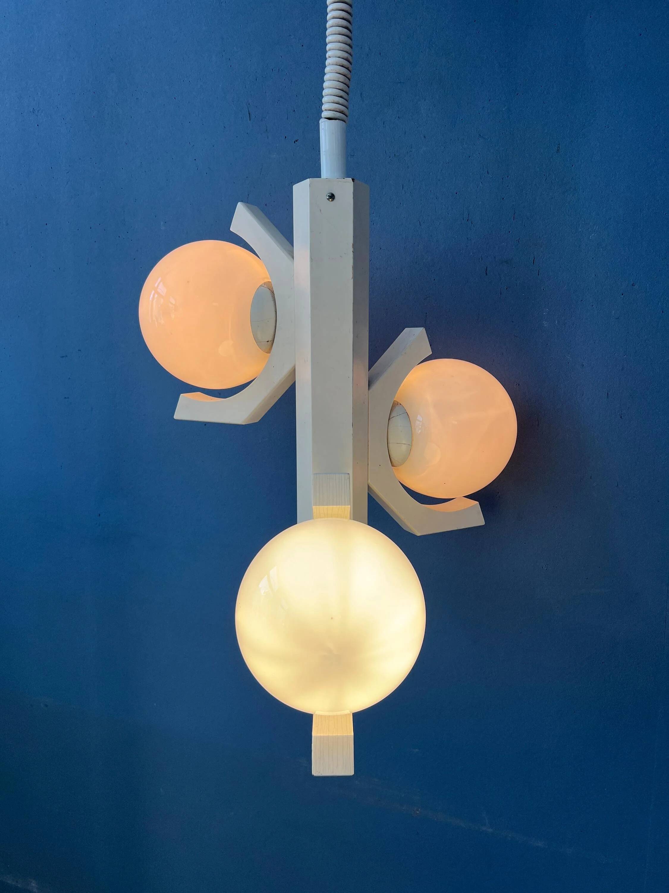 Mid-century white suspension with a bony design and opaline glass shade.