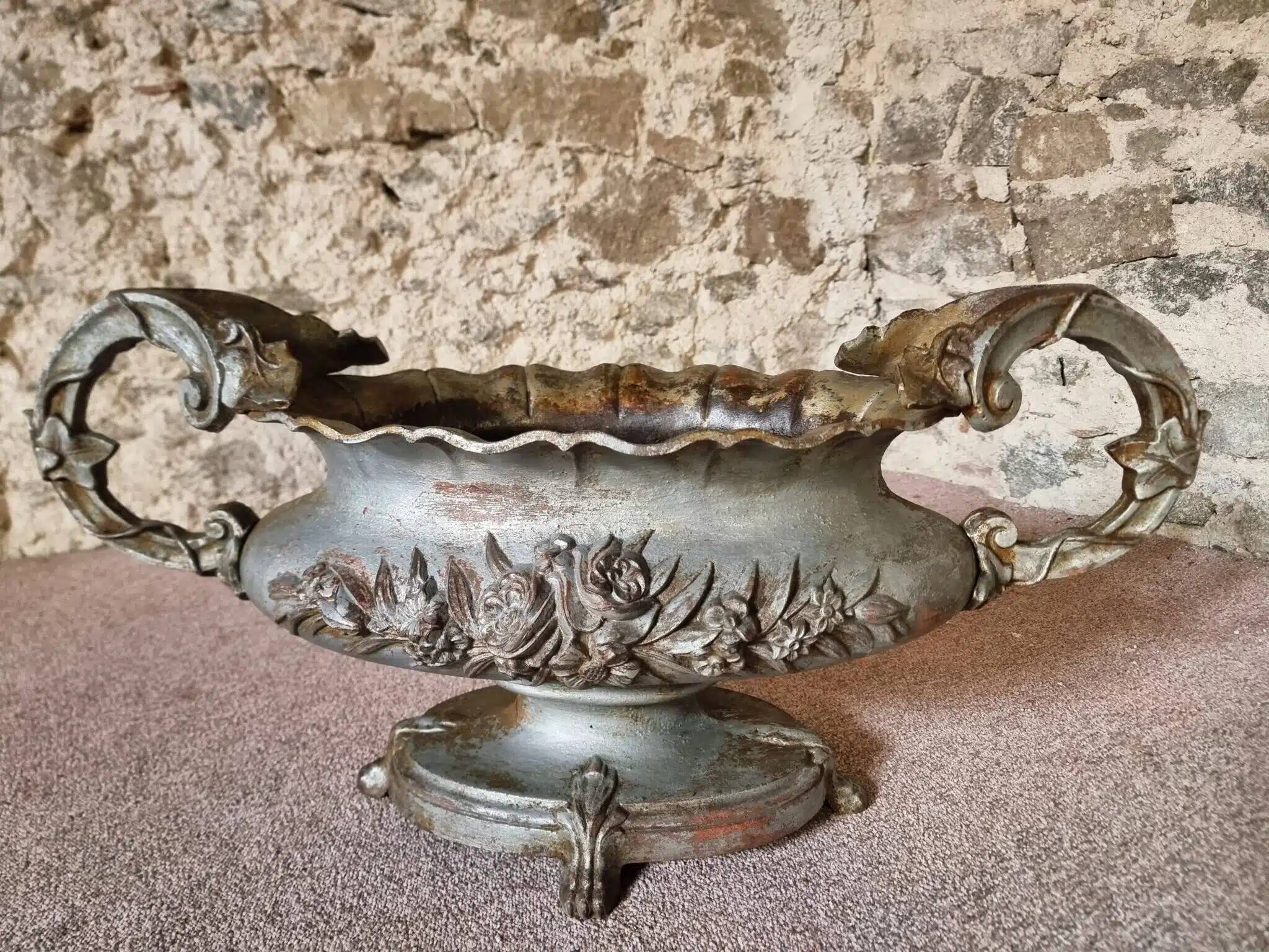 Large antique cast iron planter on a stand, France, circa 1900.