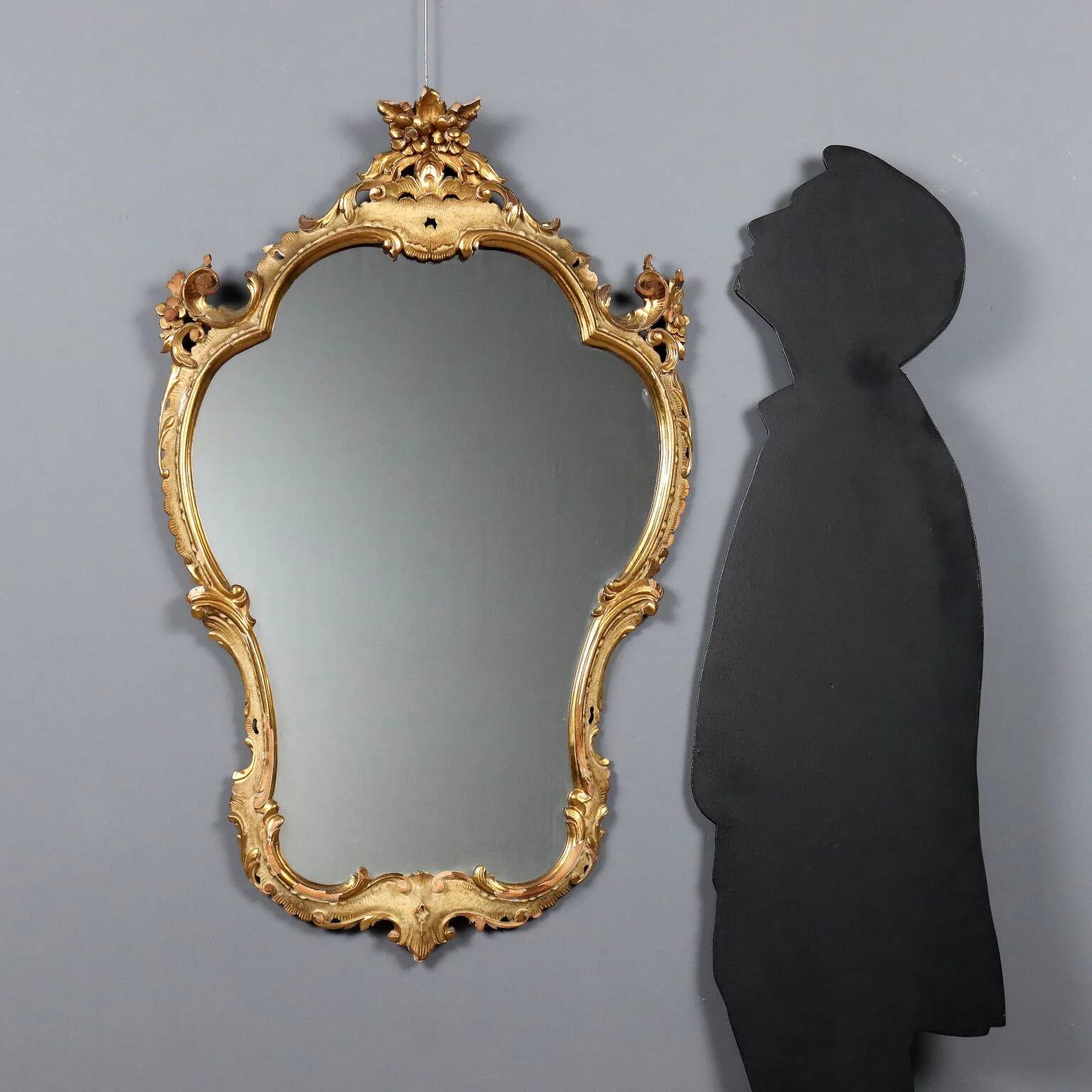 Antique baroque-style mirror in carved wood, Italy, 19th century.