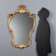 Antique baroque-style mirror in carved wood, Italy, 19th century.