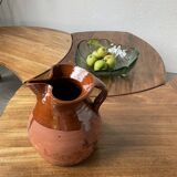 Glazed earthenware jug