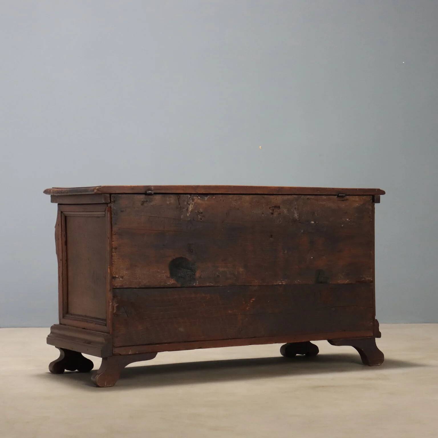 Walnut chest with baroque carvings