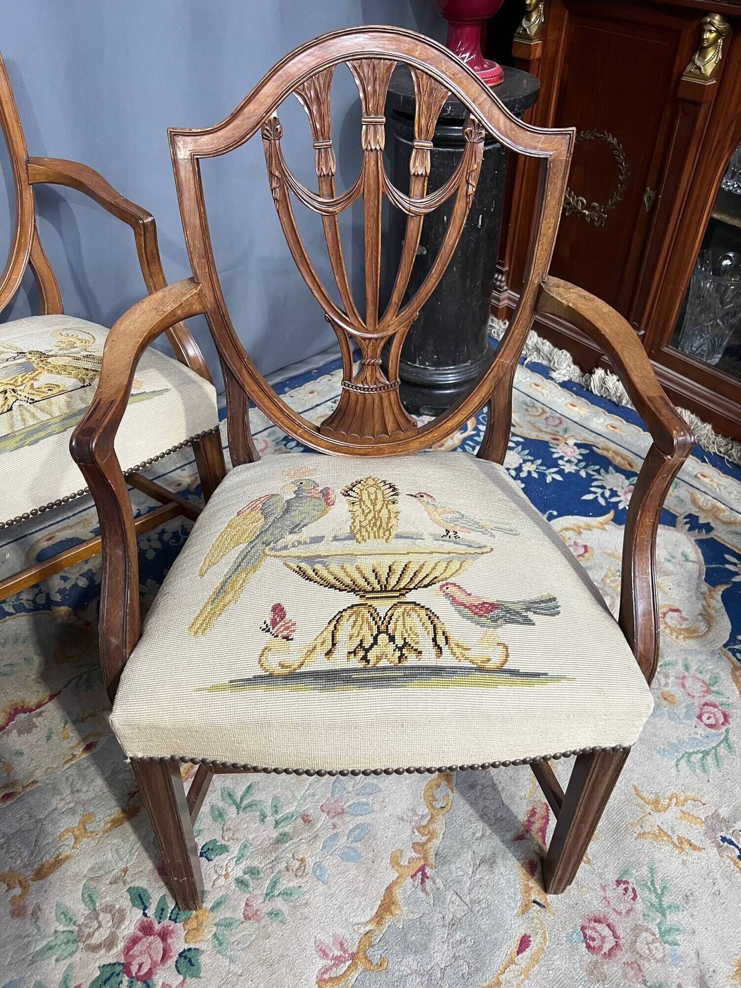 Set of four Sheraton-style armchairs. Solid walnut.