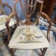 Set of four Sheraton-style armchairs. Solid walnut.