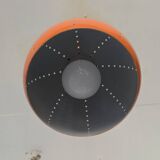 Pair of 70's globes in orange lacquered metal.