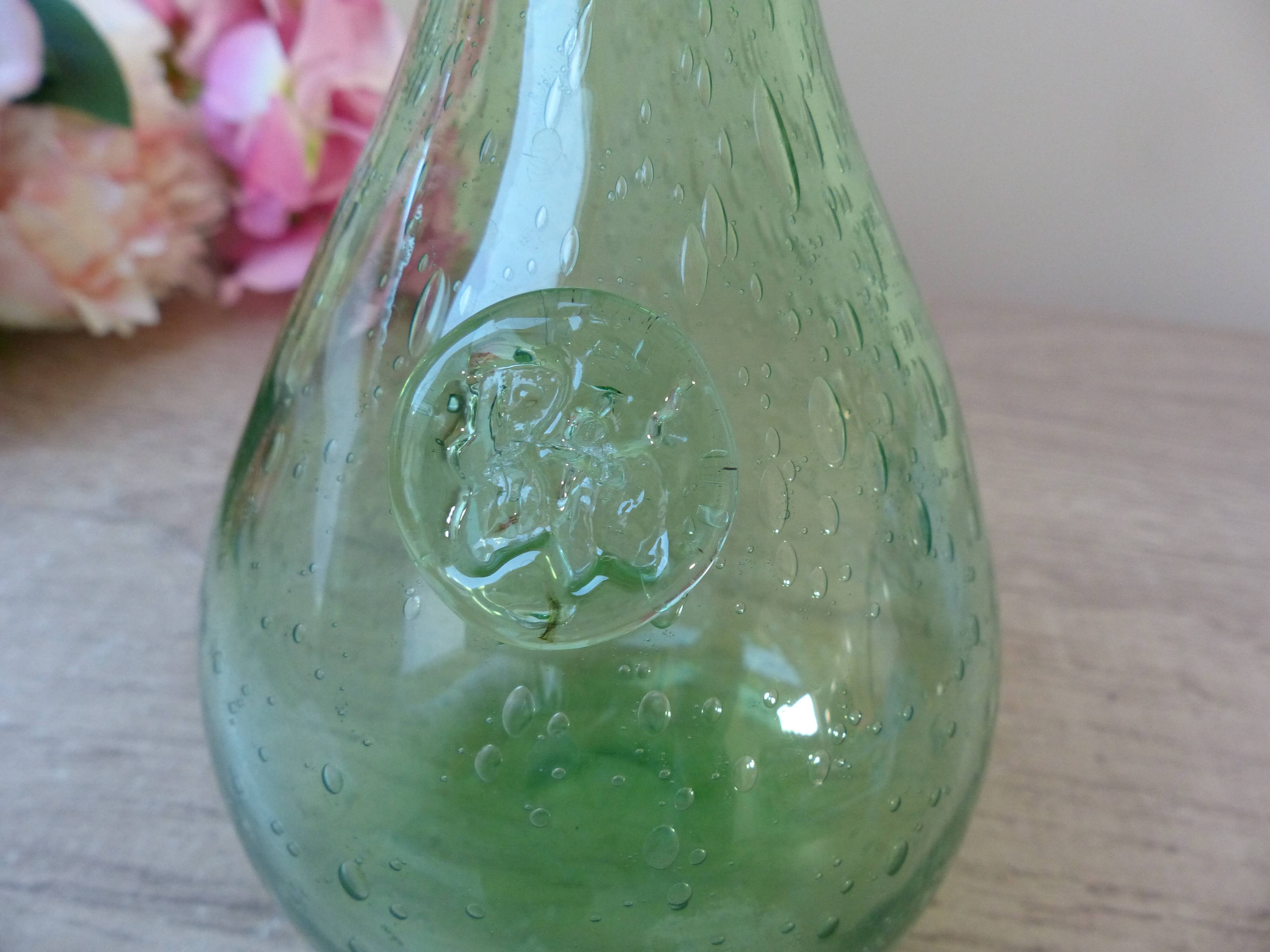 Small carafe in blown and bubble glass green color signed biot vintage