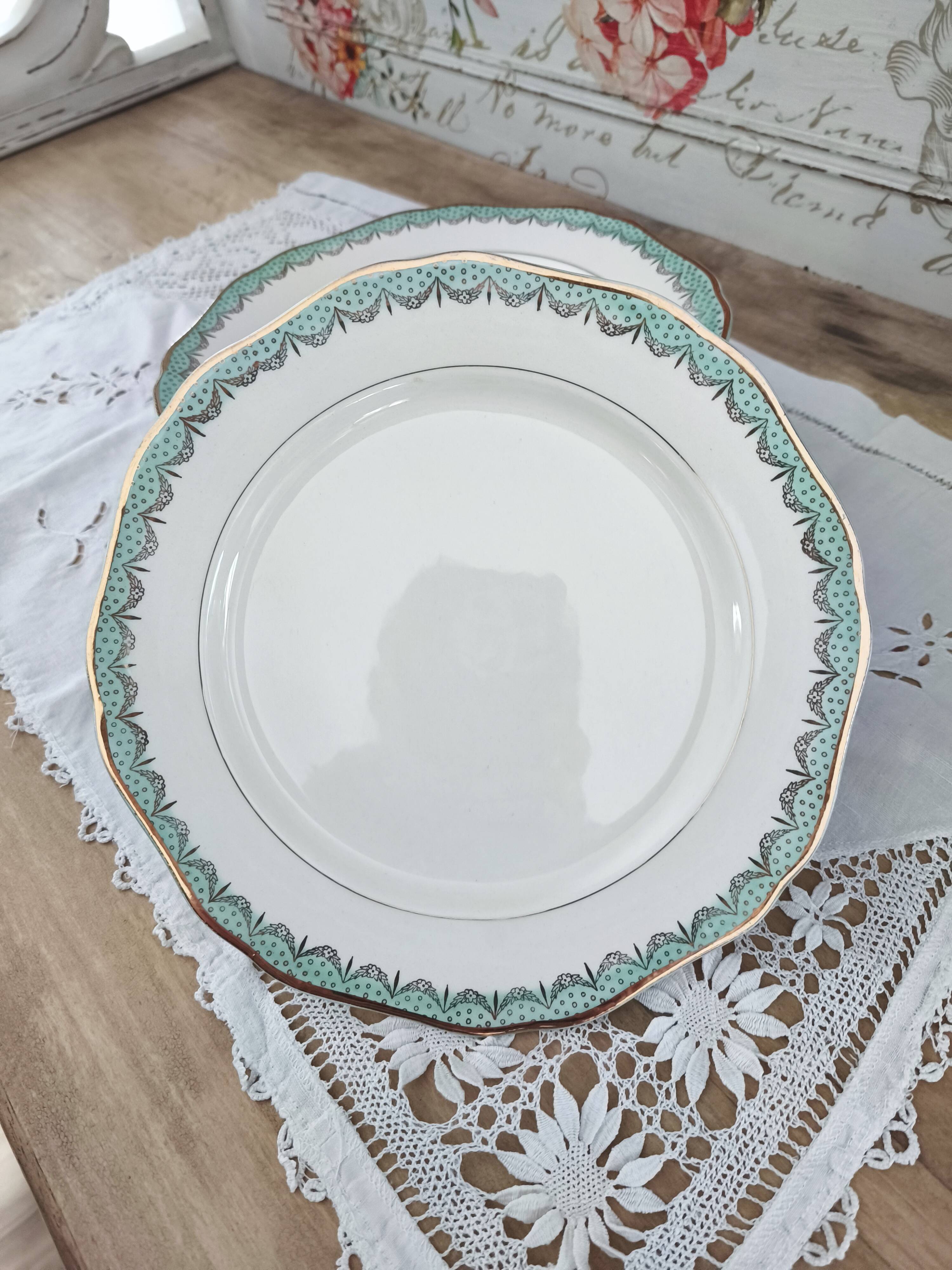 Set of 11 Longwy France earthenware dinner plates, Trianon model