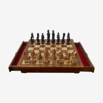 Carved wooden chess game