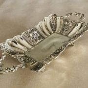 St Louis XV style letter tray, empty pocket, 20th century, in repoussé metal.