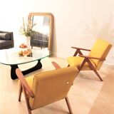 KOMPAS armchairs in grey and white.