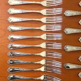Ercuis cutlery set, 124 pieces, Louis XV style, in near-new condition.