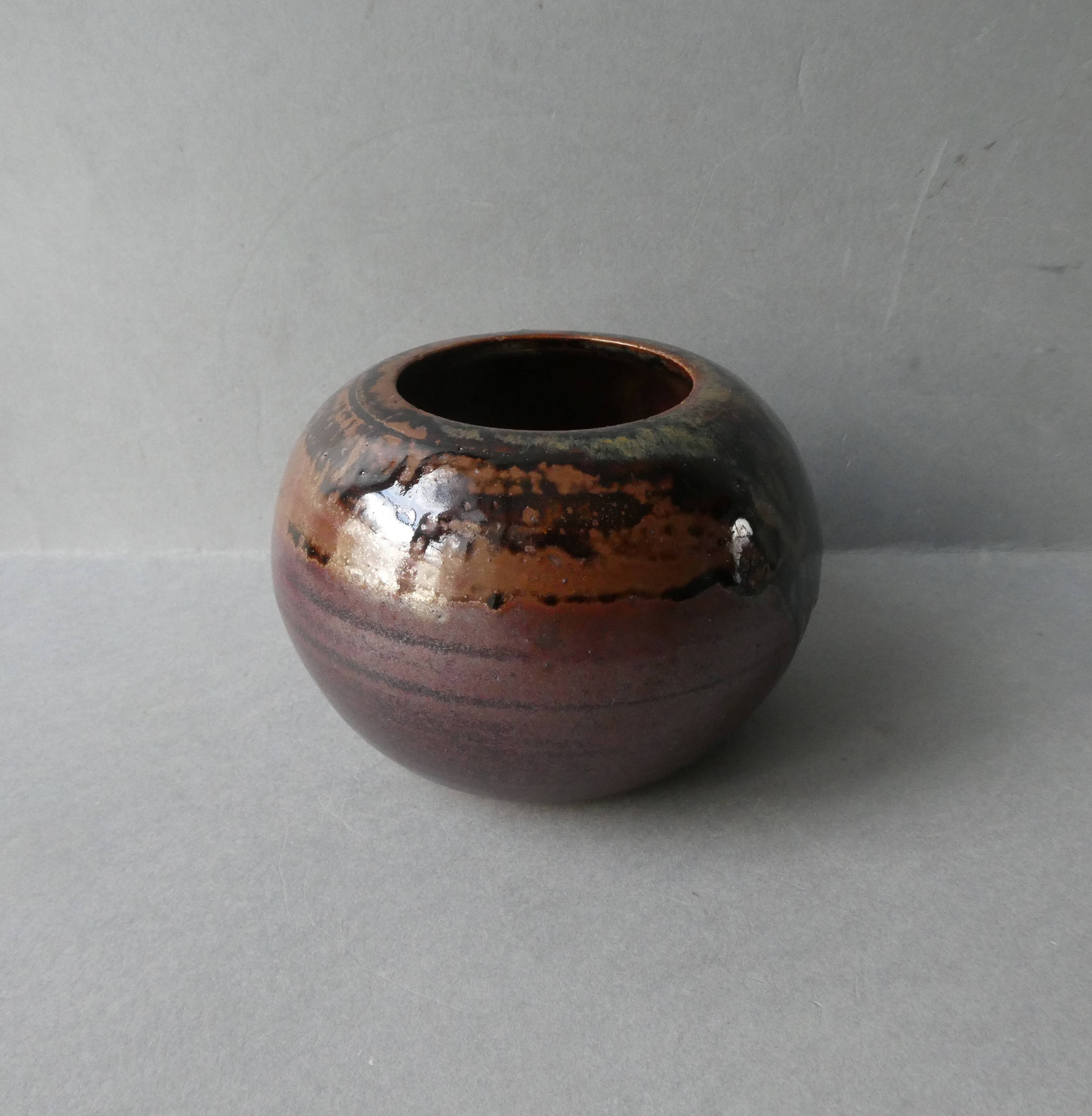 Sandstone ball vase signed Yves Remond