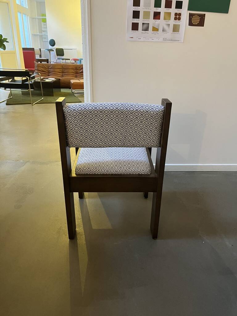 Pair of brutalist chairs in solid wood and jacquard fabric.