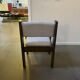 Pair of brutalist chairs in solid wood and jacquard fabric.
