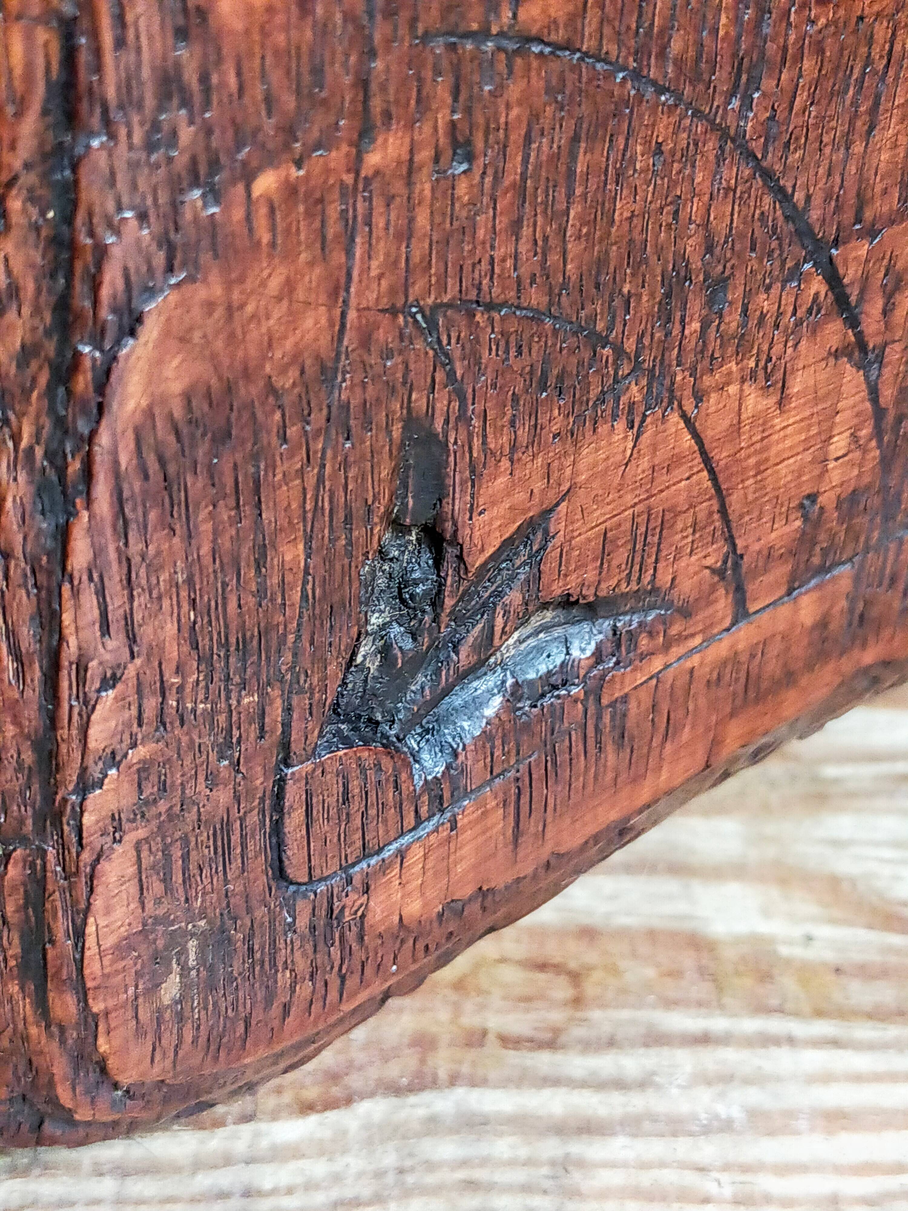 Antique stool in turned and carved solid wood