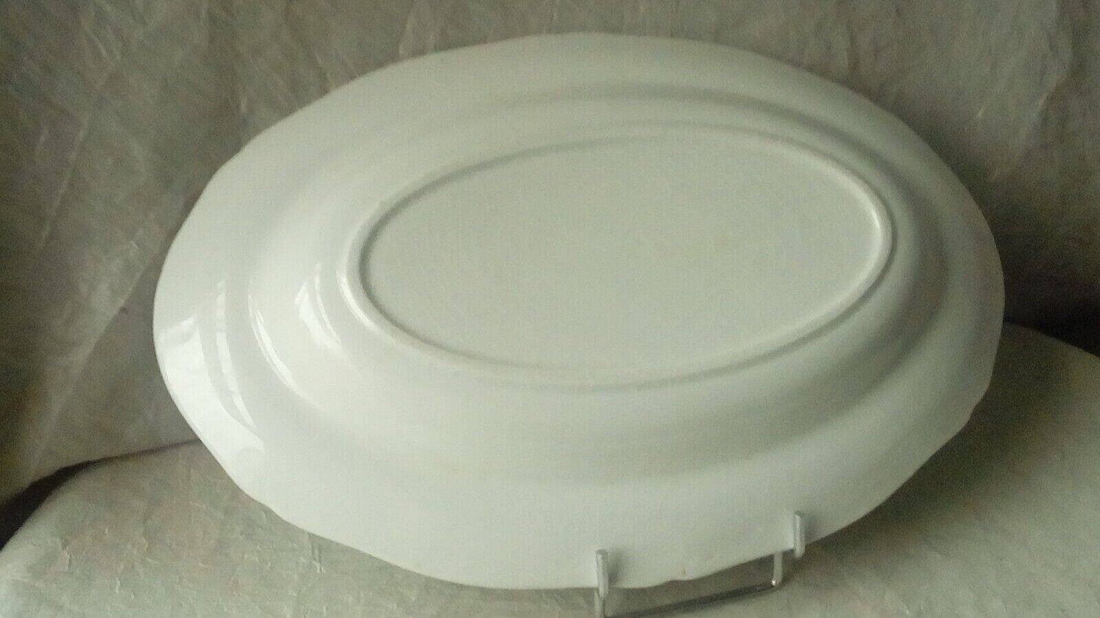 Hollow and oval earthenware dish with 4 seasons vegetable decoration