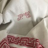 Ancient damask tablecloth with monogram