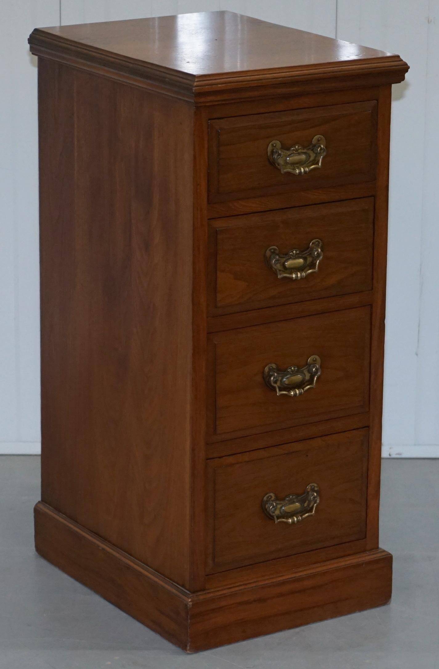 Pair of tall Victorian walnut chests of drawers