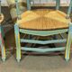 Pair of rustic armchairs in beech with straw seats.