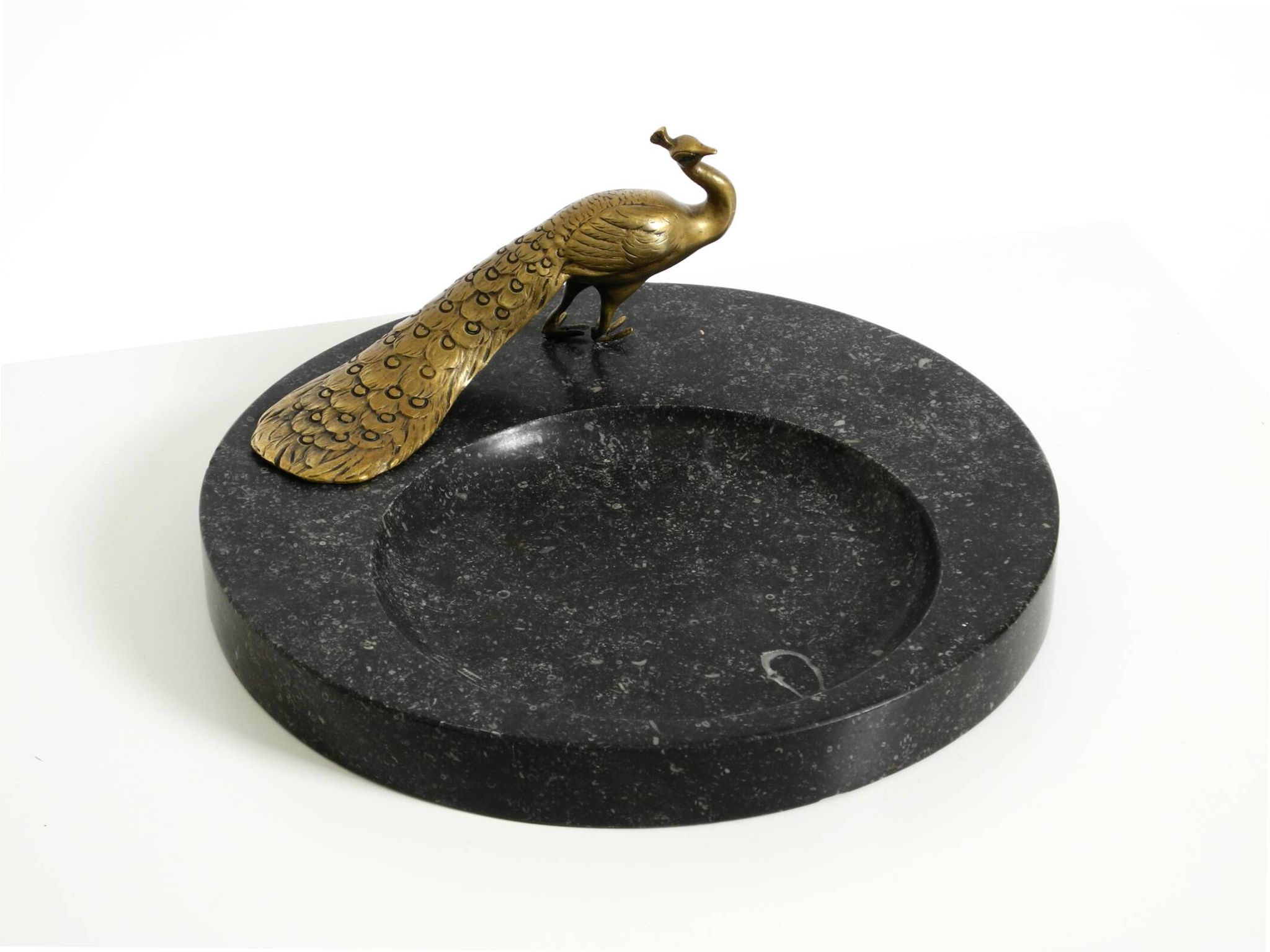 Beautiful, large black granite valet tray featuring a brass peacock, circa