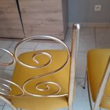 Pair of vintage golden designer chairs from the 50s