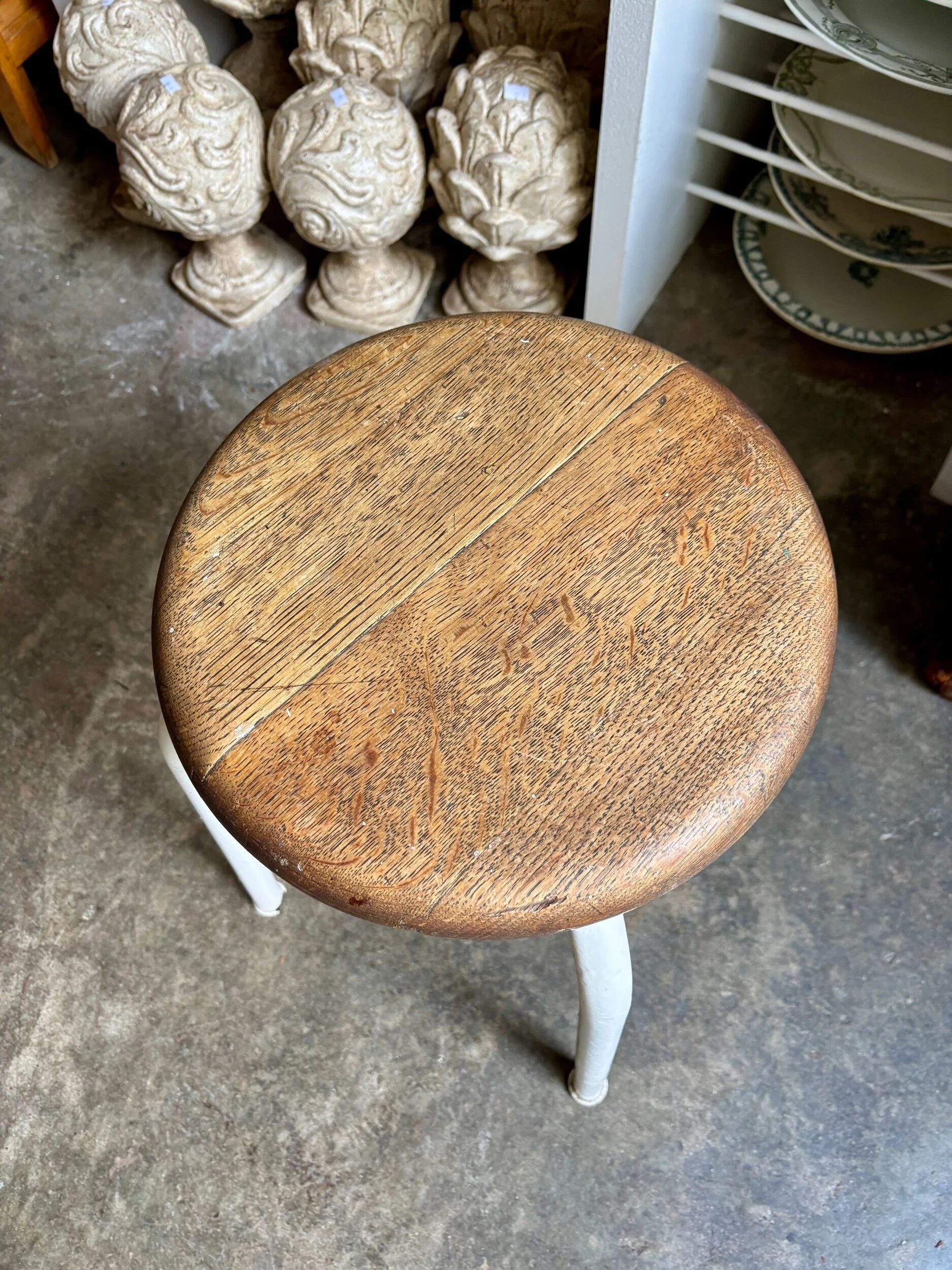 White tubular metal and wood stool