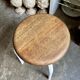 White tubular metal and wood stool