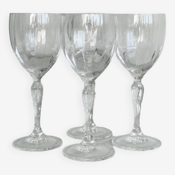 4 crystal wine glasses.