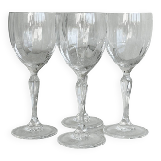 4 crystal wine glasses.