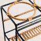 Metal cart with bamboo and wicker details.