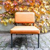 Modernist leatherette armchair