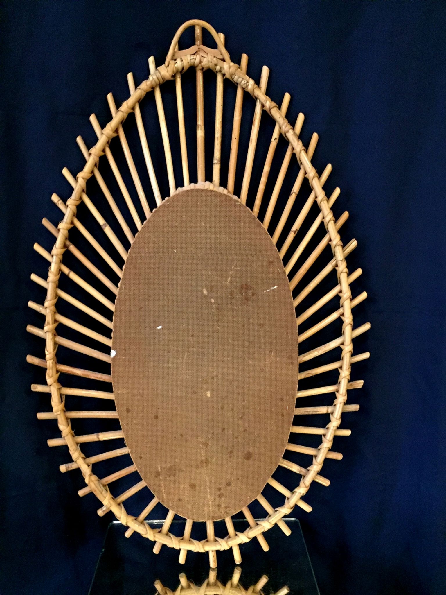 Oval shaped sun mirror in vintage rattan 1960/1970