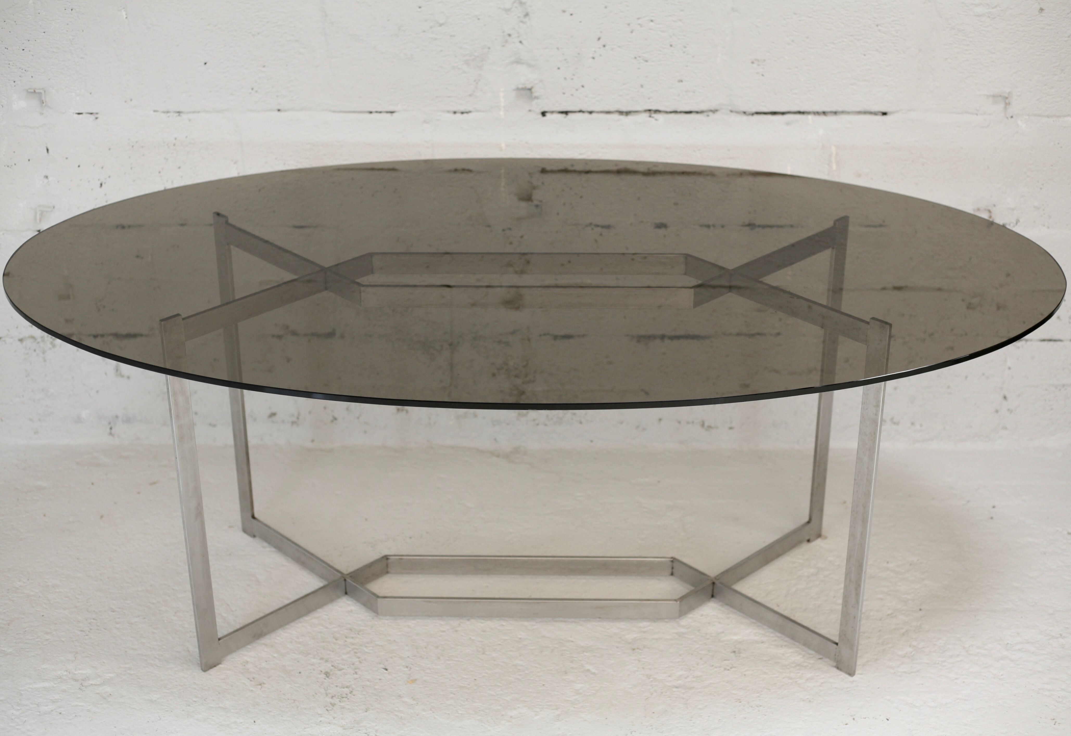 Table de Paul Legard, édition DOM, aluminium brossé et dalle elliptique de verre fumé, France, circa