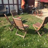 Four teak chairs