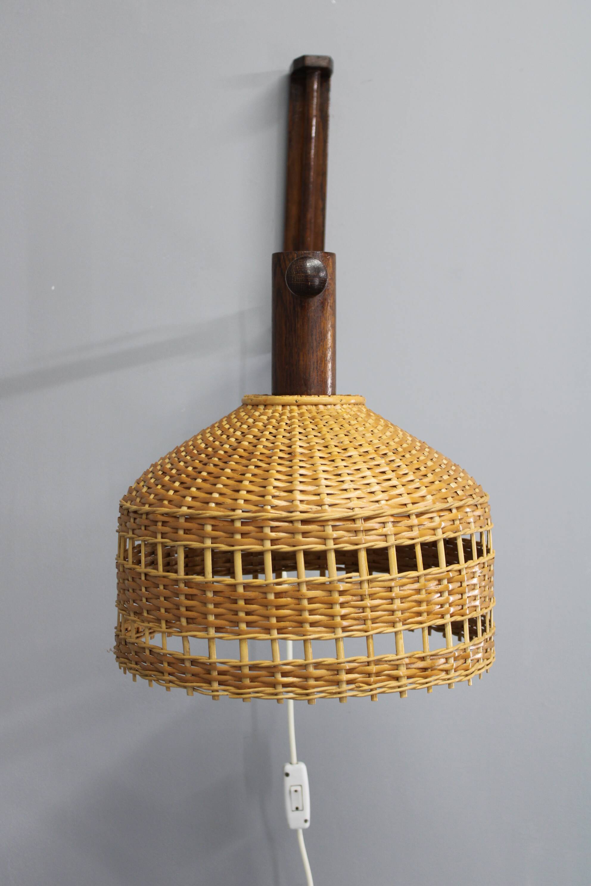 Adjustable mid-century wooden wall lamp with rattan shade, 1970s