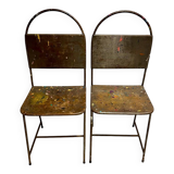 Pair of vintage raw metal chairs